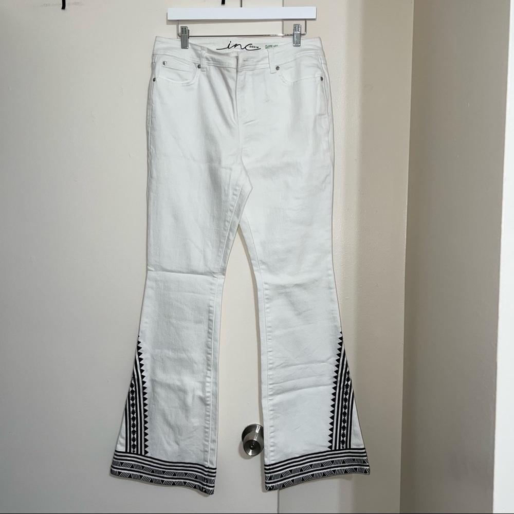 White flare leg Inc Denim